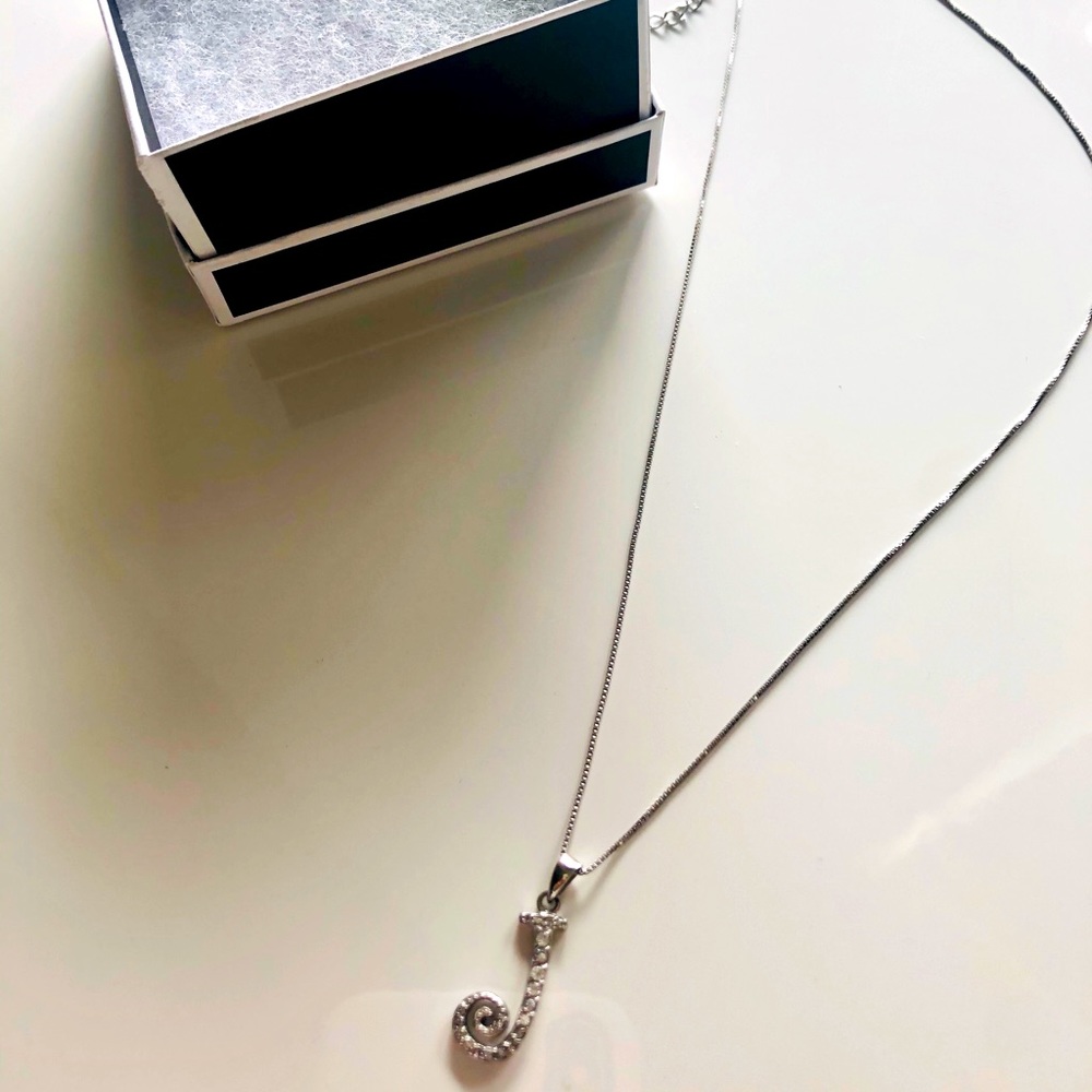 Sterling silver ‘J’ charm with chain.